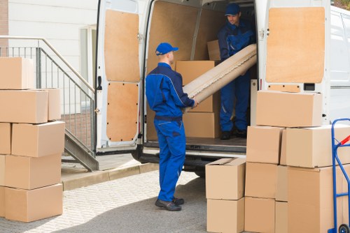 Storage team assessing items for a transparent Leamouth Storage quote