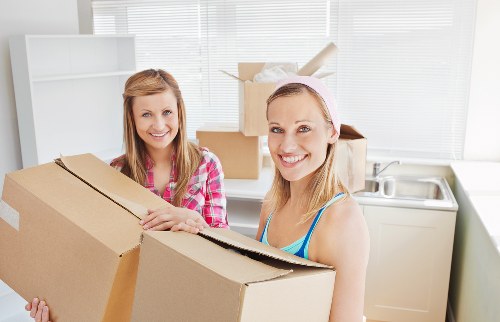 Careful handling of fragile items by packing experts in Leamouth